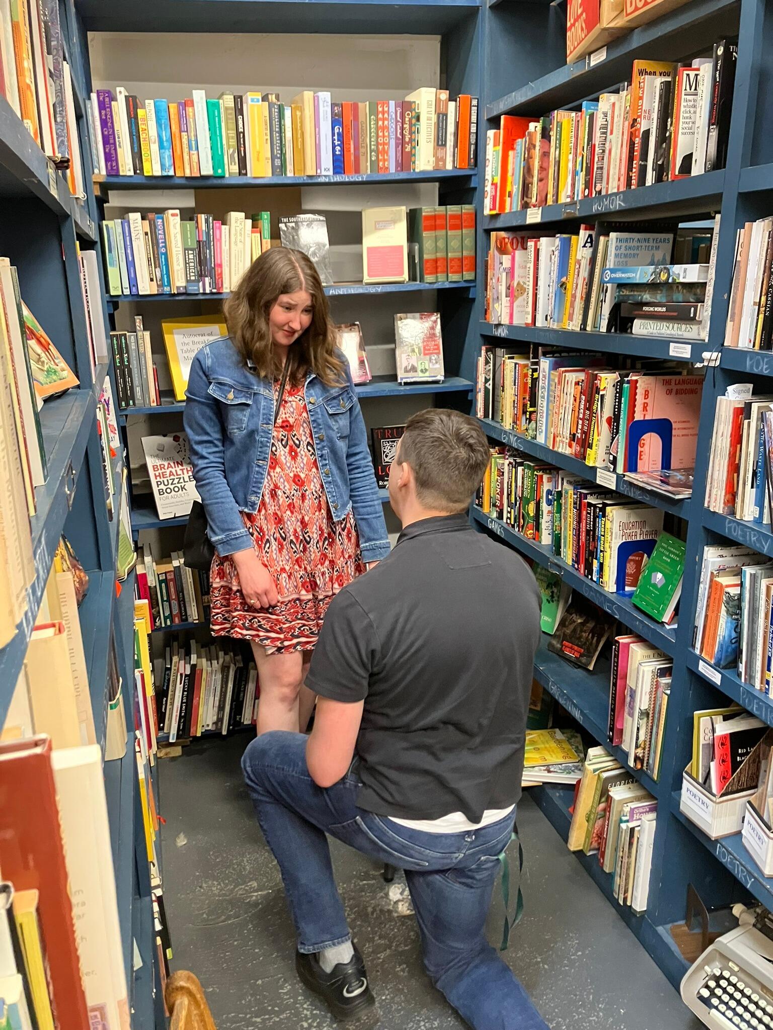 Back at Burke's Books, Seth proposed with roses and the perfect ring! It was a beautiful moment, followed by a little more book-shopping, because they are nerds.