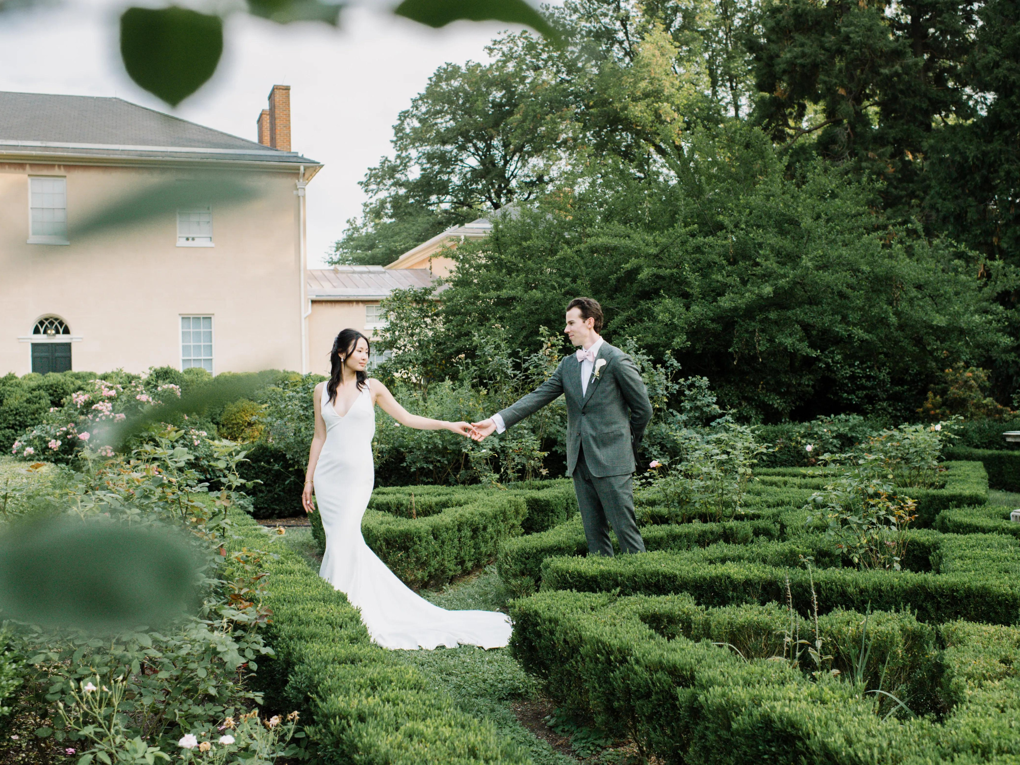 Bride and groom standing in maze at Tudor Place Historic House & Gardens small wedding venue in Washington DC