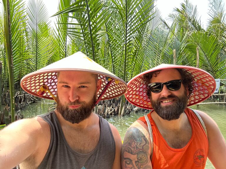 Visiting Vietnam, trying to fit in with the locals on the coconut boats.
