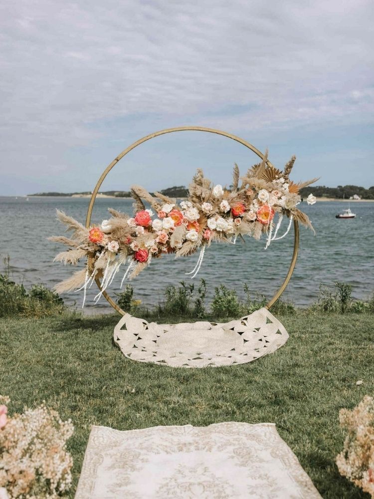 round wedding arch with pampas grass