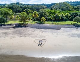 Couple on beach in Costa Rica destination wedding.