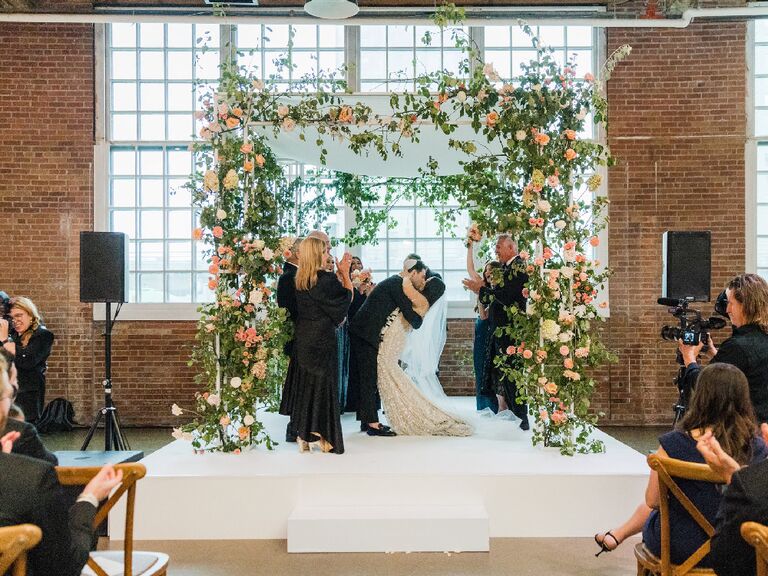 Jamie Milne and husband Brandon during wedding ceremony