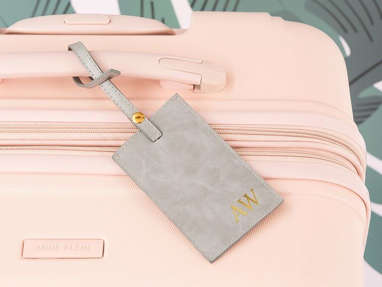 Light gray vegan leather luggage tag with gold monogram