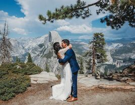 Couple embracing at their wedding on the mountains