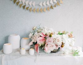 pale pink centerpiece with modern white candles