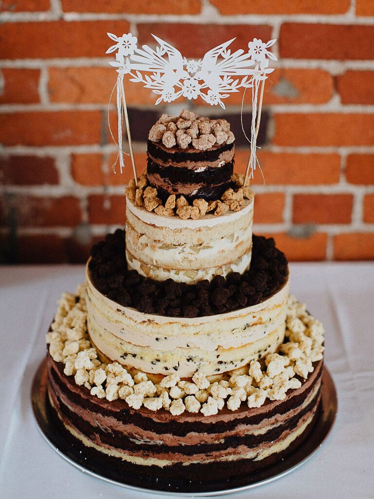 Four-tier naked rustic cake with exposed layers