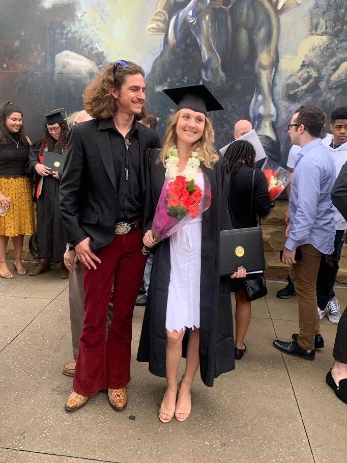 Nick surprises Dev at her graduation from UCF