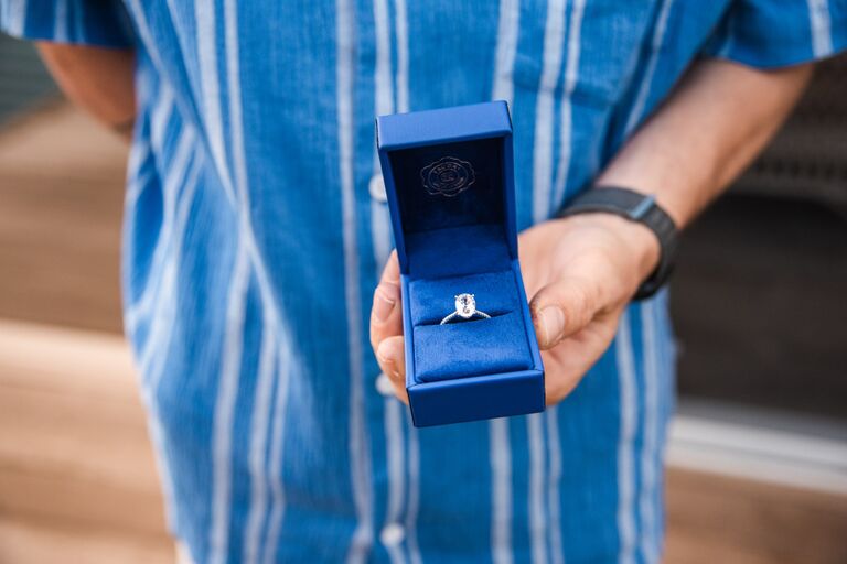 After over 4 years christian decided it was tie to pop the question. 