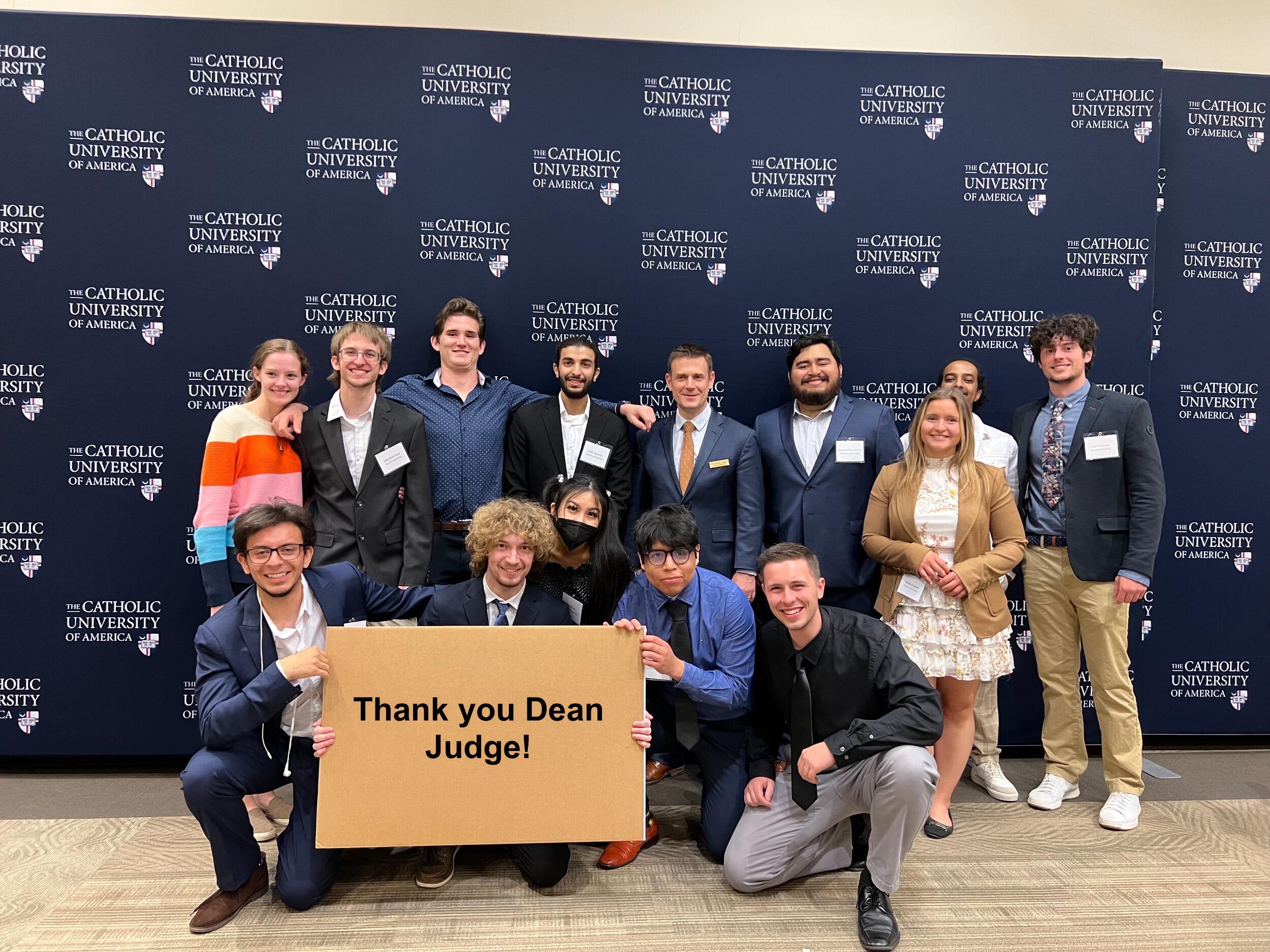 Meghan supporting Johnathan and his engineering friends at his senior design day at CUA right before graduation.