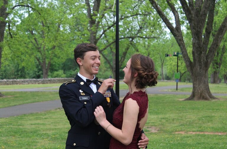 On May 5, 2018 was Zoë and Colby's first Military Ball together as a couple. Fun fact is that her God-Father, Kendal Strachan (father of the ring barriers) carried her around park taking pictures so that Zoë's shoes wouldn't get ruined.