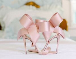 Blush pink wedding heels with pink bows