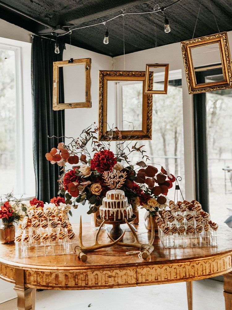 dessert table decorated with picture frames