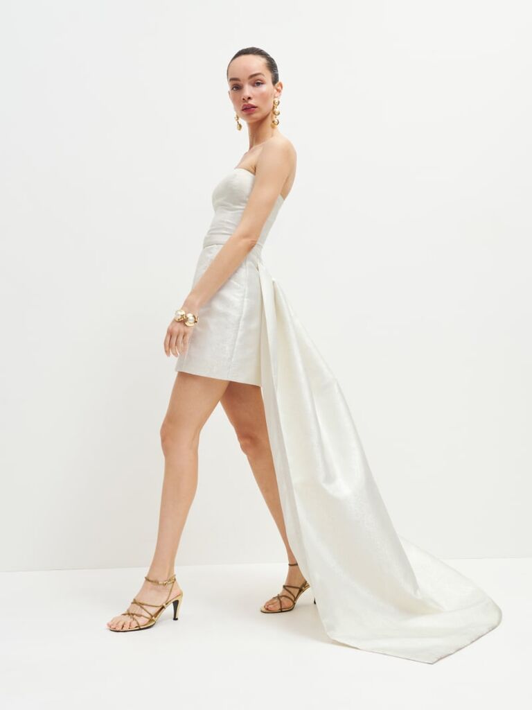 White rehearsal dinner mini dress with train from Reformation