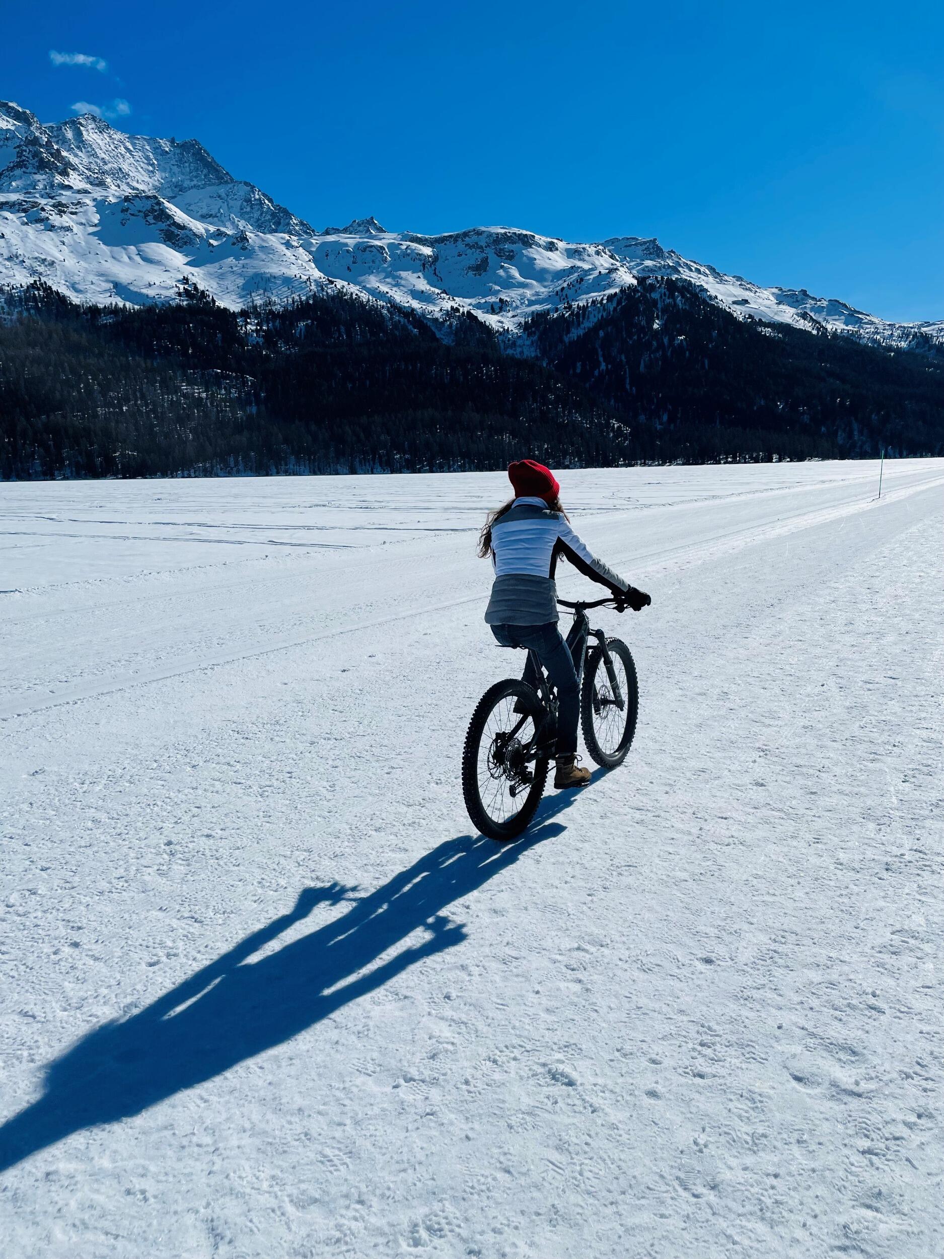 Mountain biking on the lake of Silvaplana,