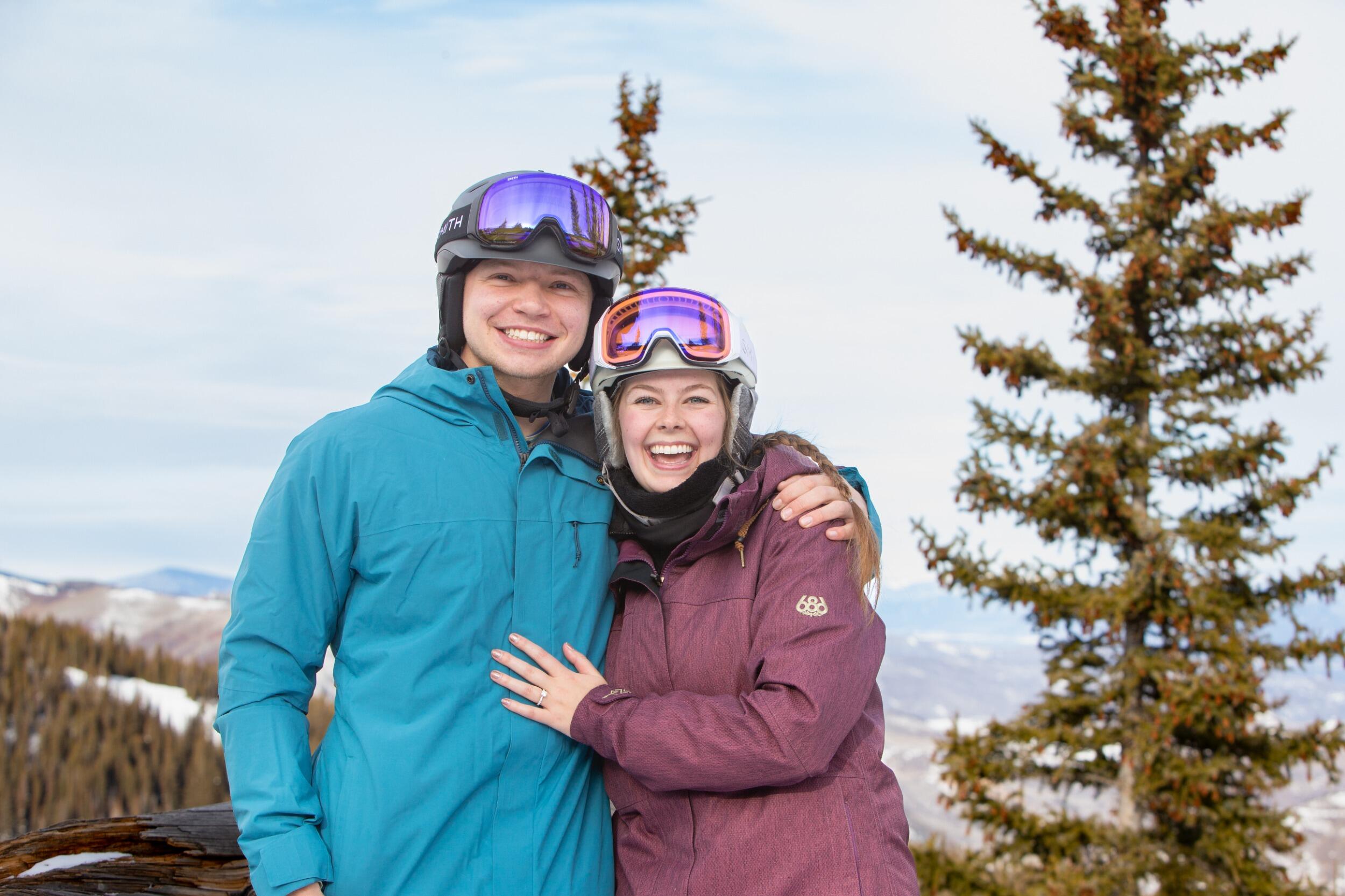 Riley came skiing with Hannah's family and proposed to her on mountain. It was spectacular.