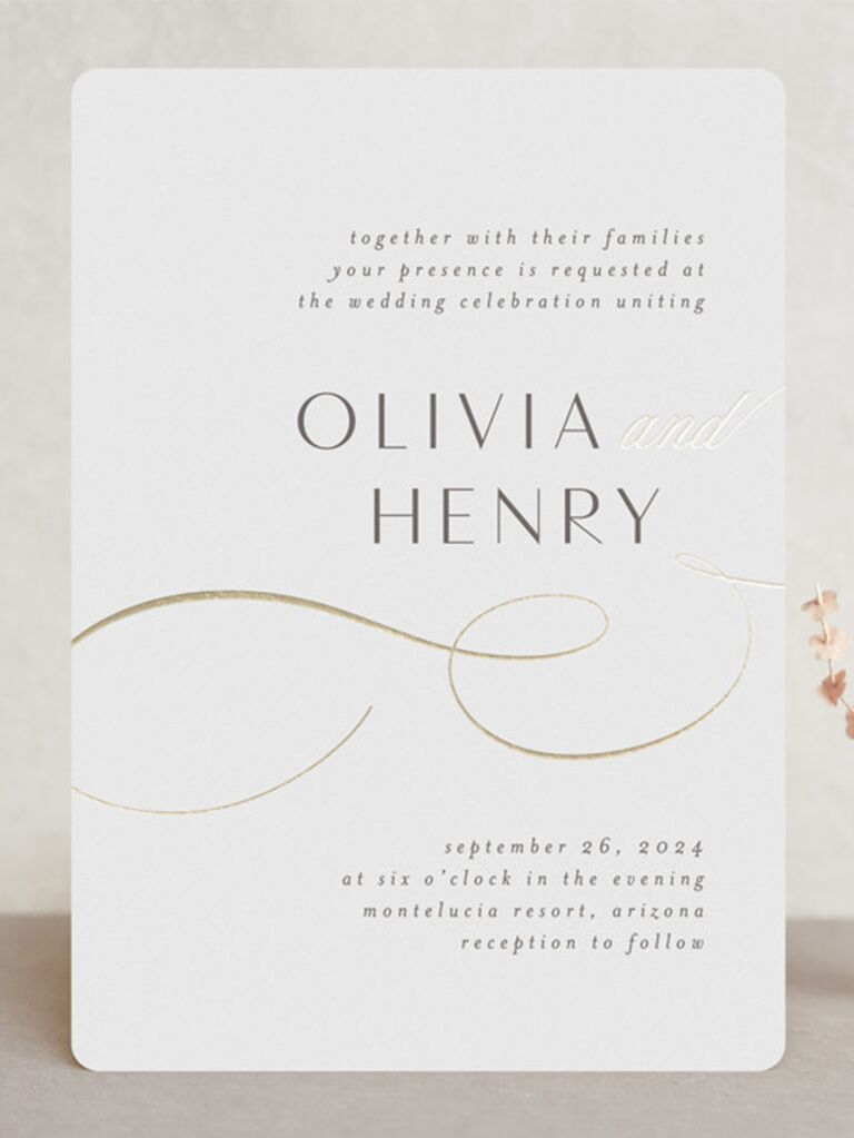 Gold and silver foil details with name in bold minimalist type on white background