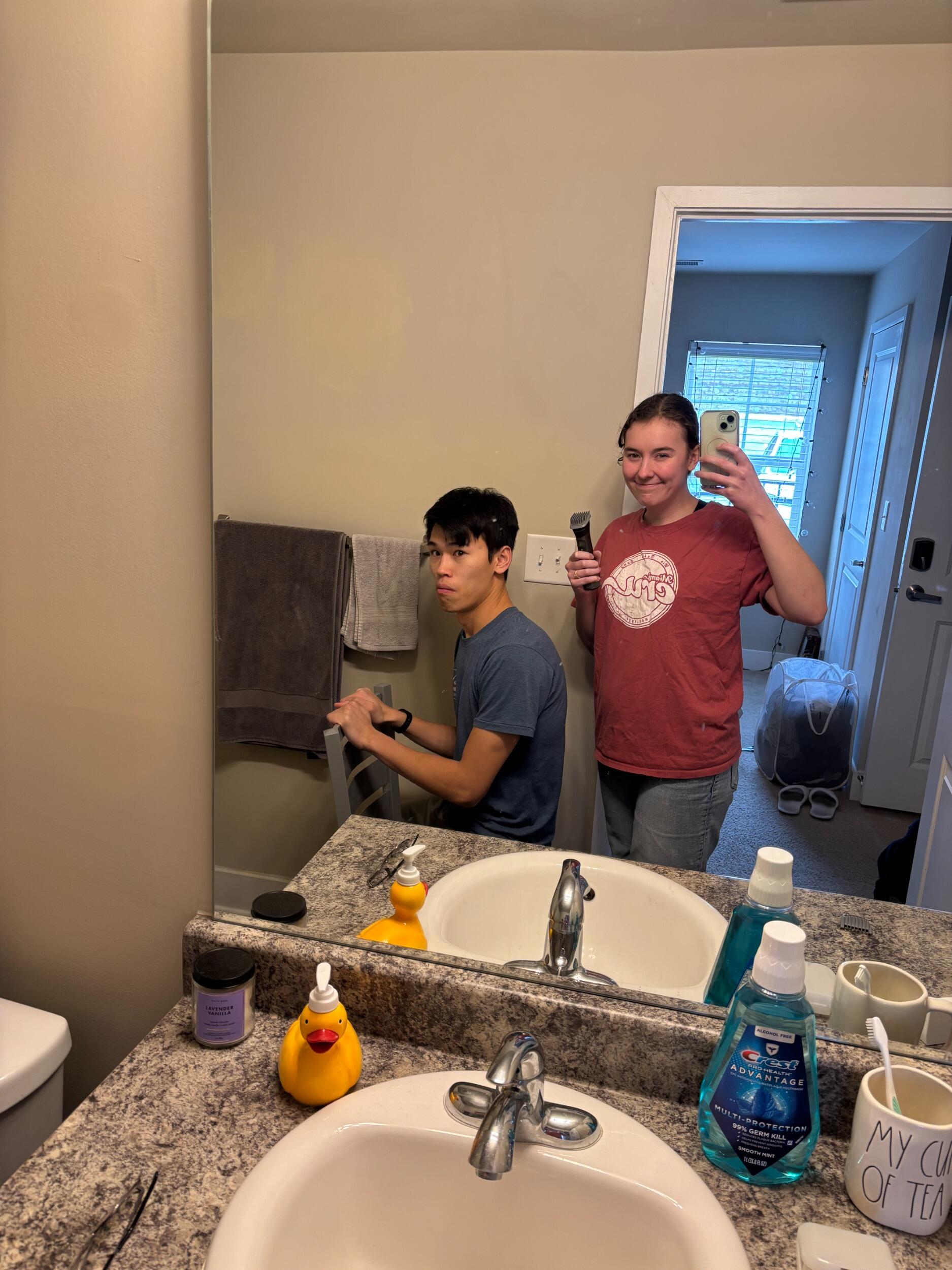 Kristen's first time giving Jonathan a haircut...Jonathan was a happy customer