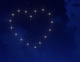 Drone light show making a heart shape