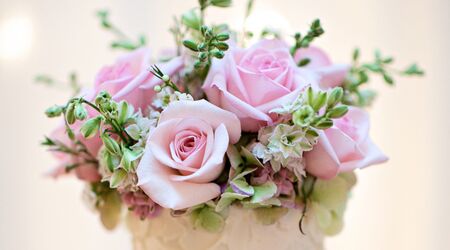 Tea kettle and basket with pink wild roses. Wedding or birthday Stock Photo  by ©ChamilleWhite 76569759