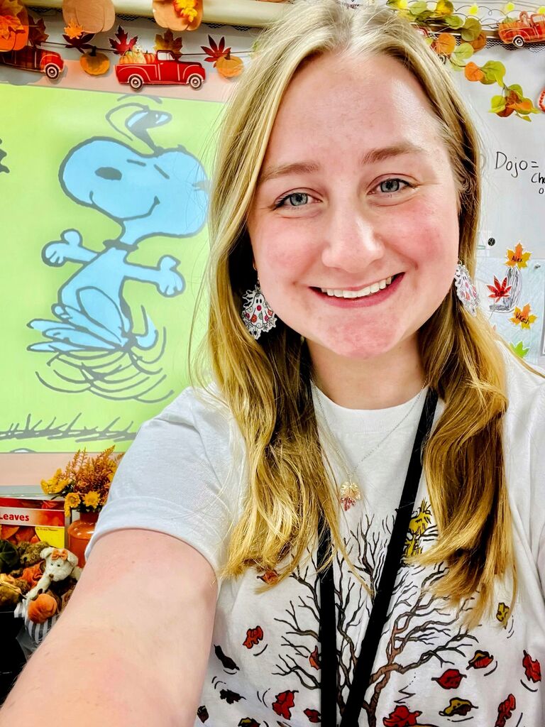 Bailey feeling happy in her new kindergarten classroom.