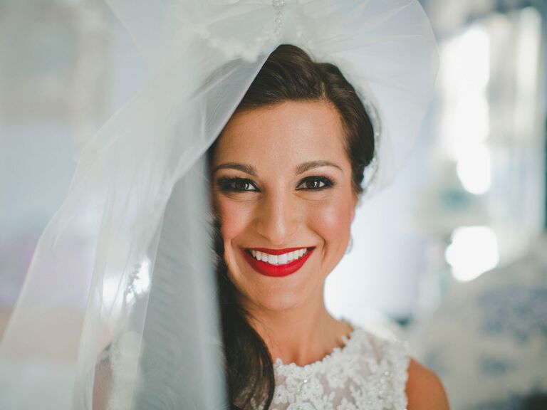 Bride with bright red party lip