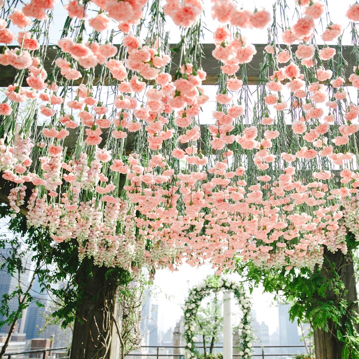 flowers hanging from rafters - wedding vendors list