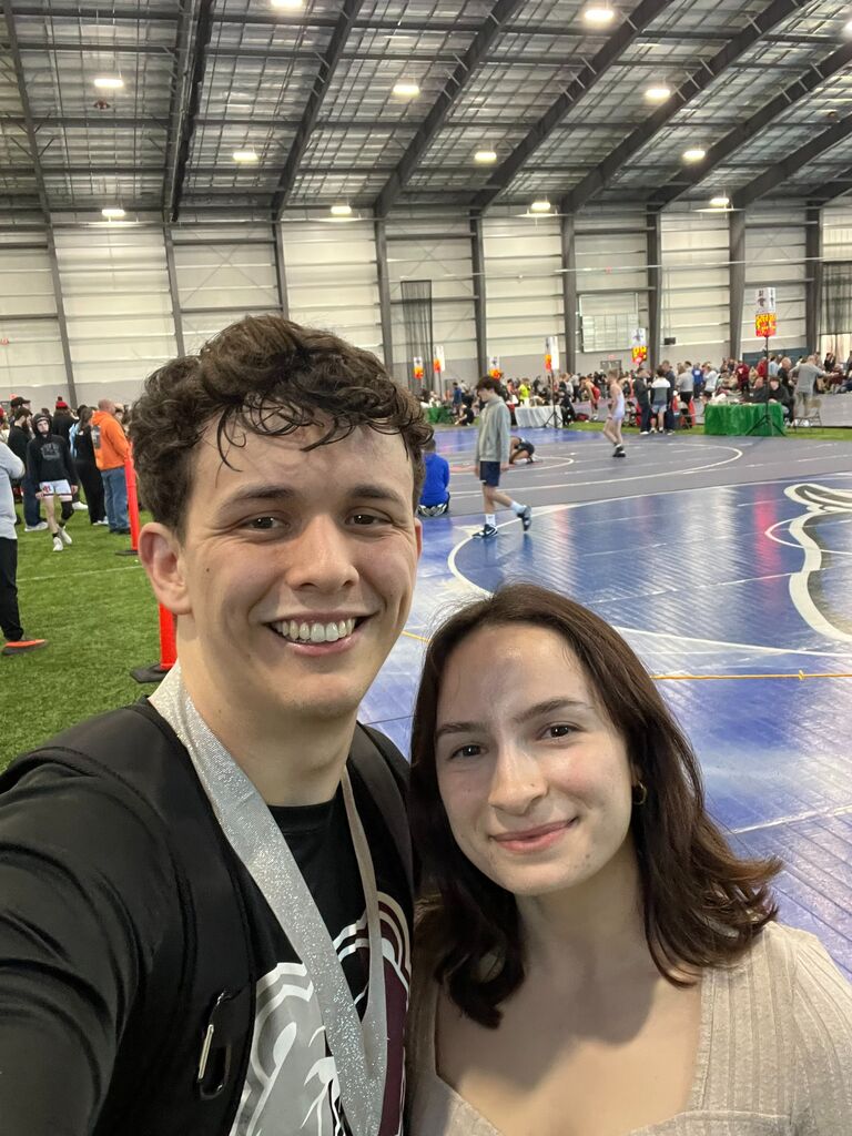 Mikayla cheers on Nathan to the Indiana Folkstyle state tournament. He got 2nd at 74kg for ages 18-23!