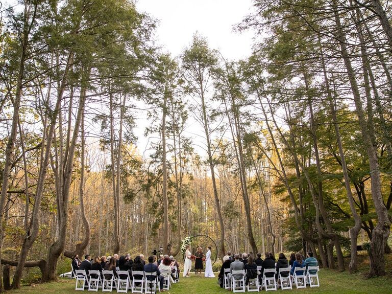 Couple exchanging their vows in the forest