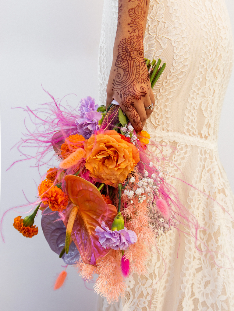 playful wedding henna with birds and bouquet