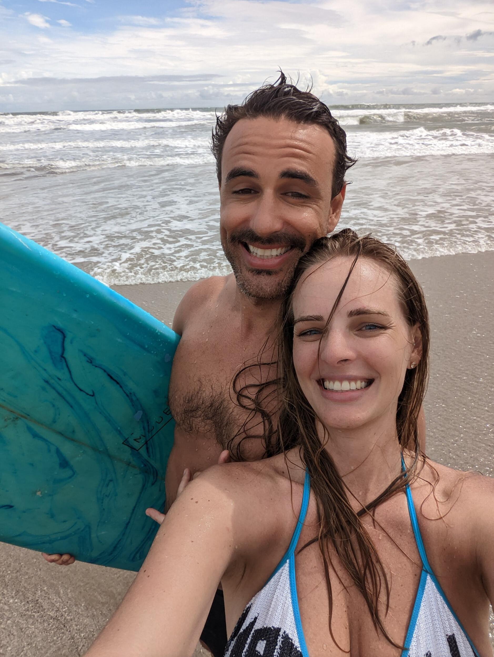 Kip trying to teach Laura how to surf. Costa Rica