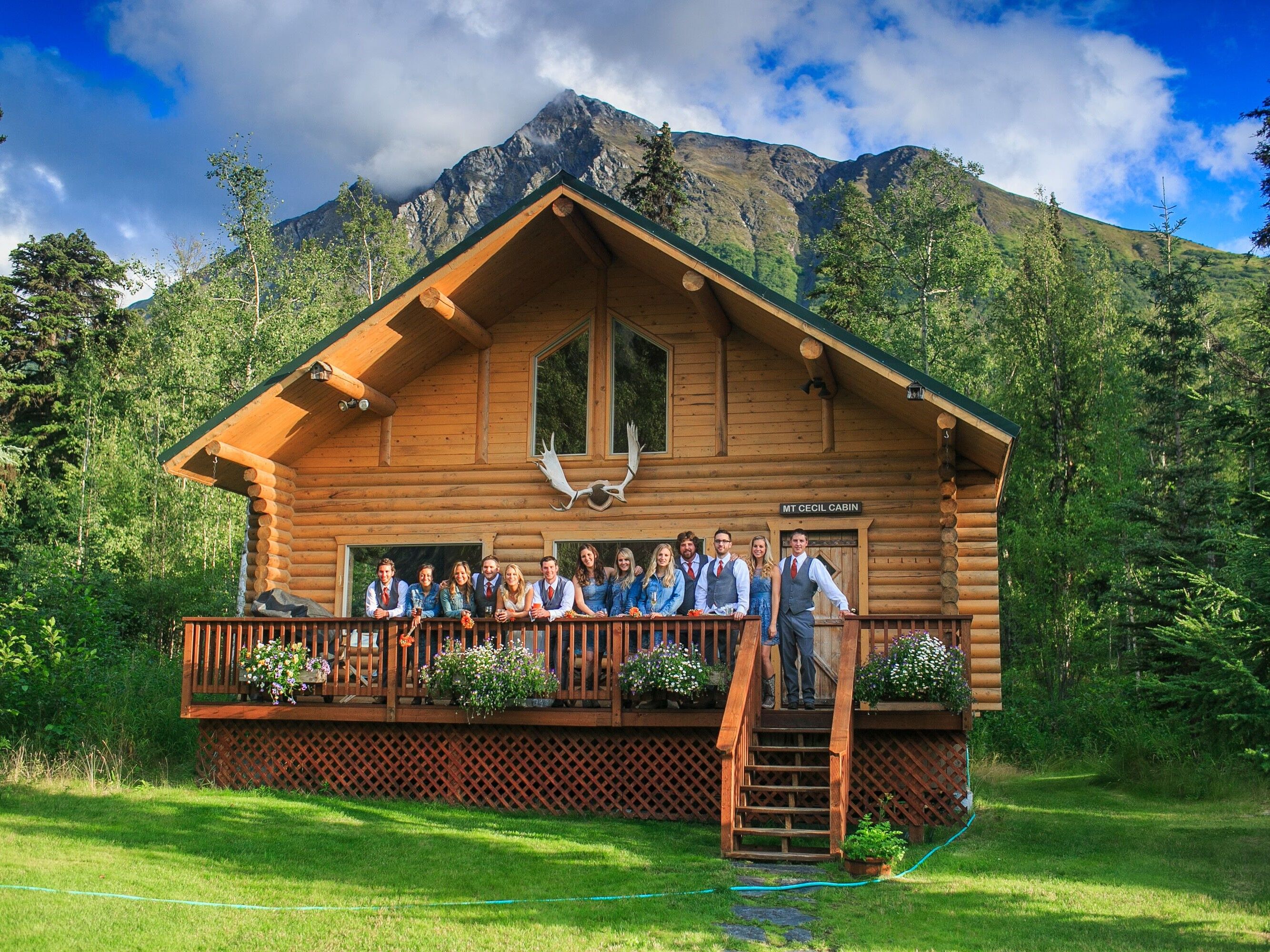 Wedding party on the balcony of the Alaska Heavenly Lodge