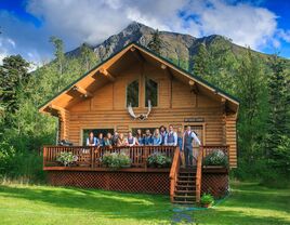 Wedding party on the balcony of the Alaska Heavenly Lodge