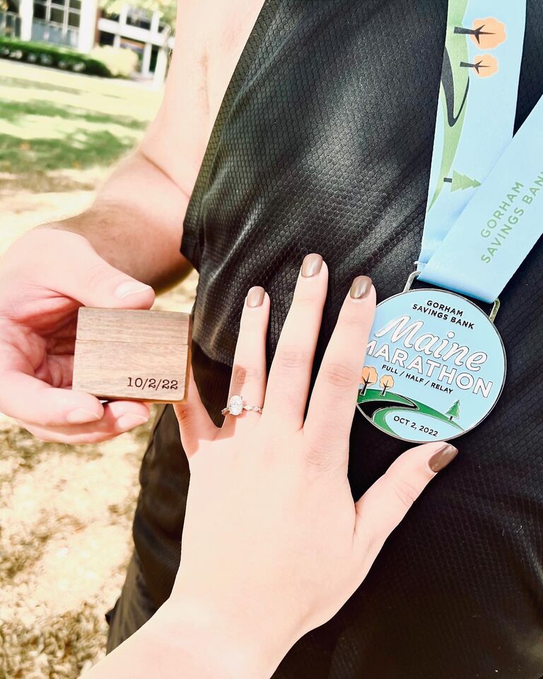 Kael proposed! Shortly after finishing his marathon in Portland, Maine. I remember his legs being so tired he wasn't sure if he would even be able to get down on one knee. 

We loved our trip to the East Coast, and this was the most perfect way to end it!
