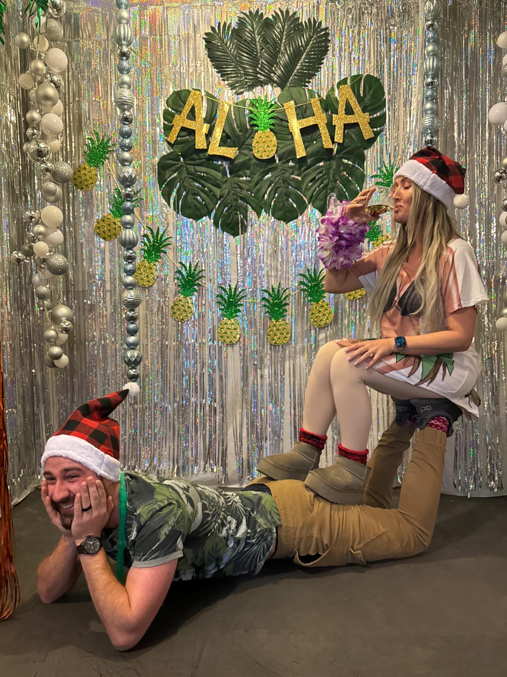 "awkward" couples photoshoot at Hawaiin Hussar Xmas 2024