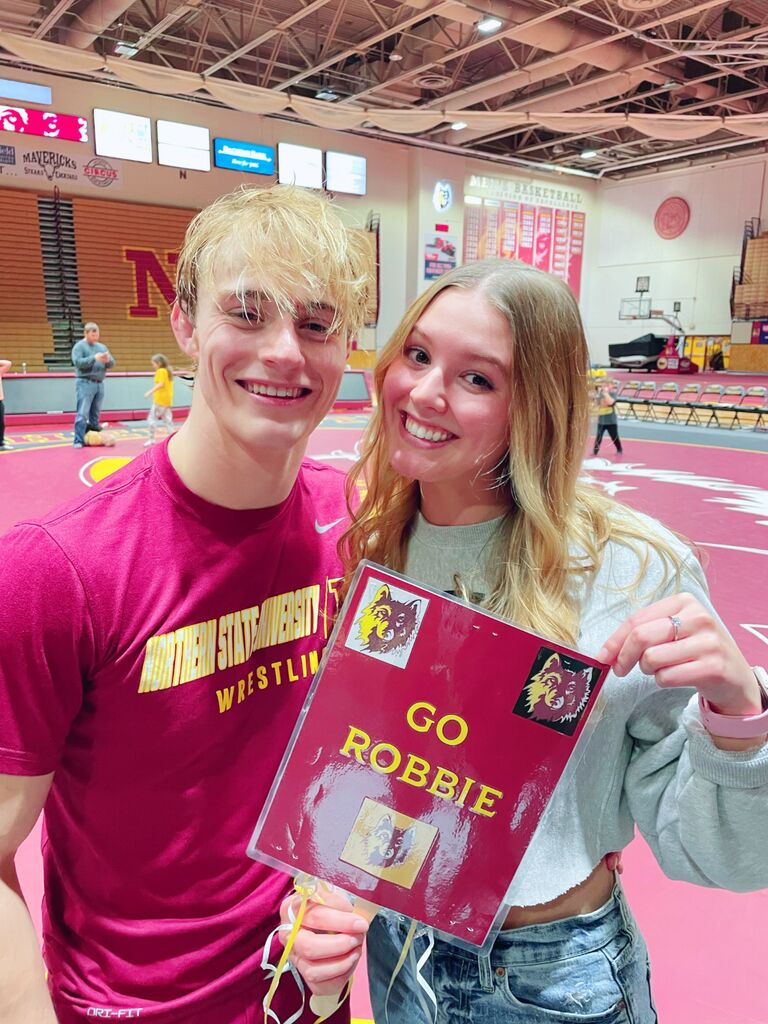 Robbie's graduate wrestling season.