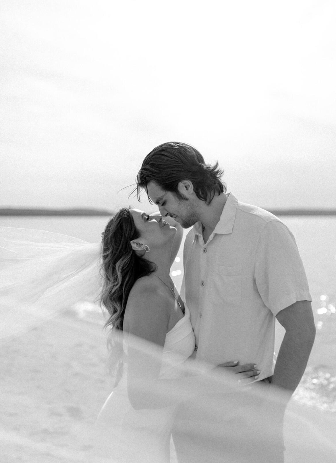 We decided we couldn’t wait to be married! We had a small courthouse ceremony with immediate family, followed by a backyard BBQ on Torch Lake. 