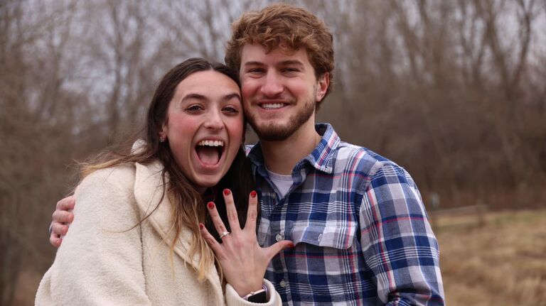 This picture says it all... the happy couple after their engagement