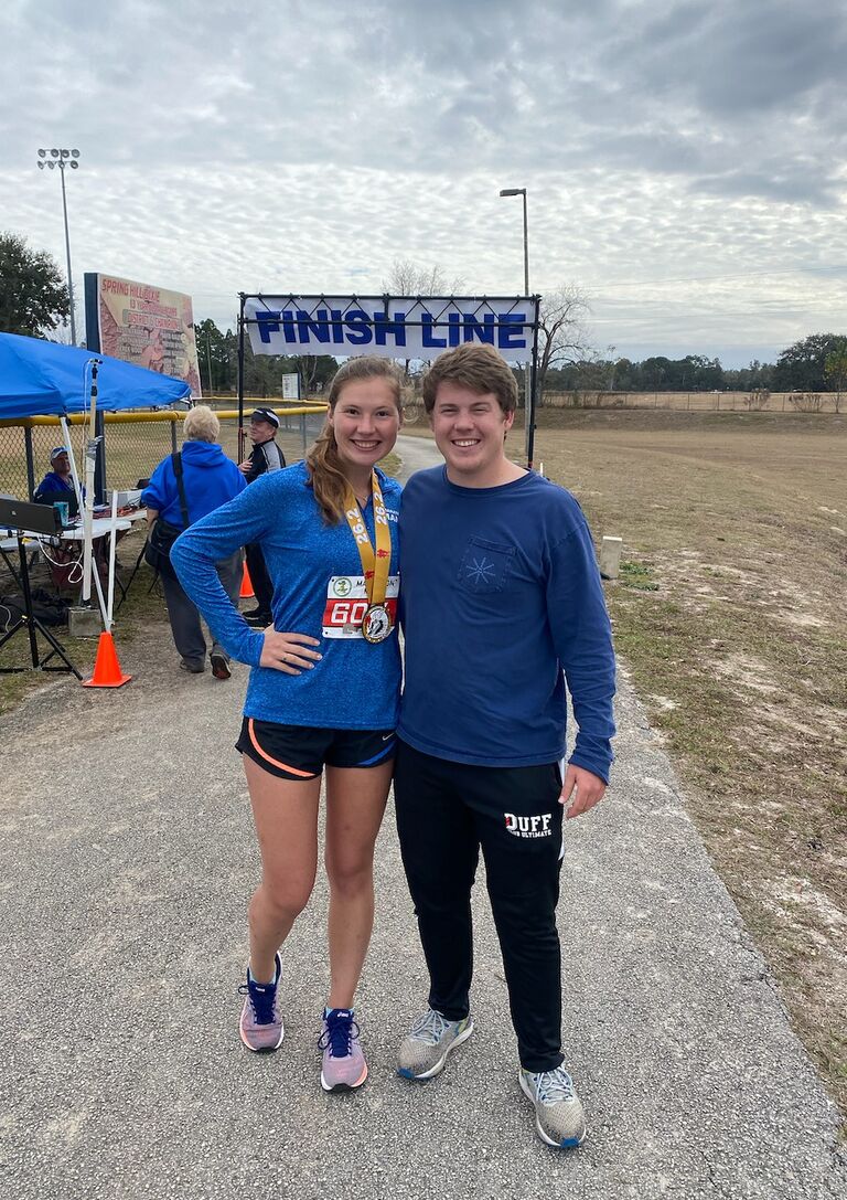 Kathryn ran her first marathon with Patricia and Mama Abely and Max saved the day with his enthusiastic cheering and gatorade delivery services.