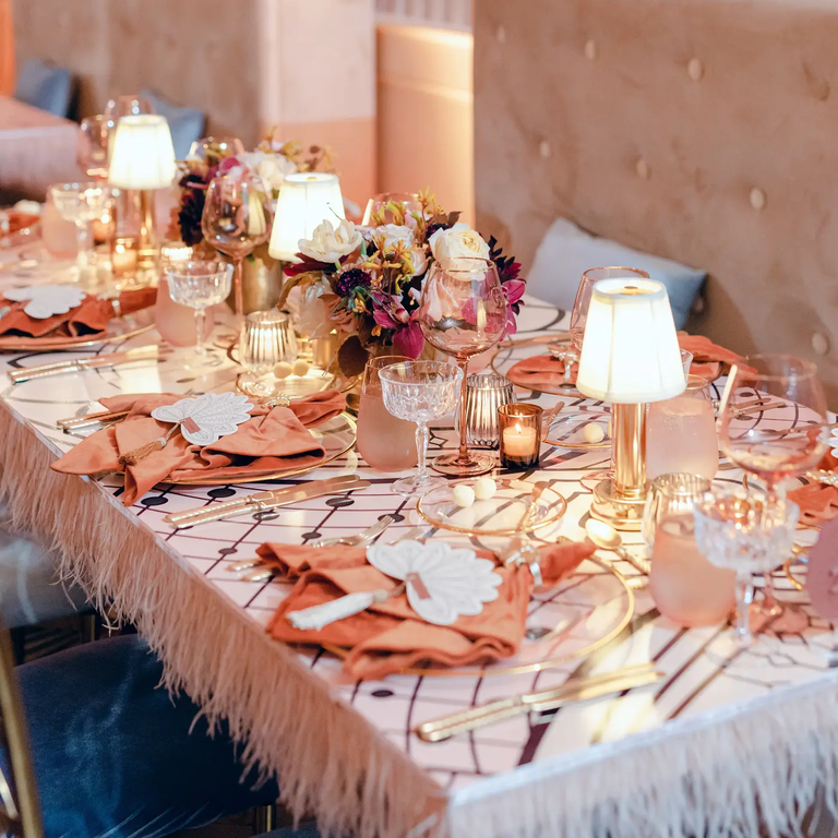 Pink reception dining table with fringe, taylor swift themed wedding 