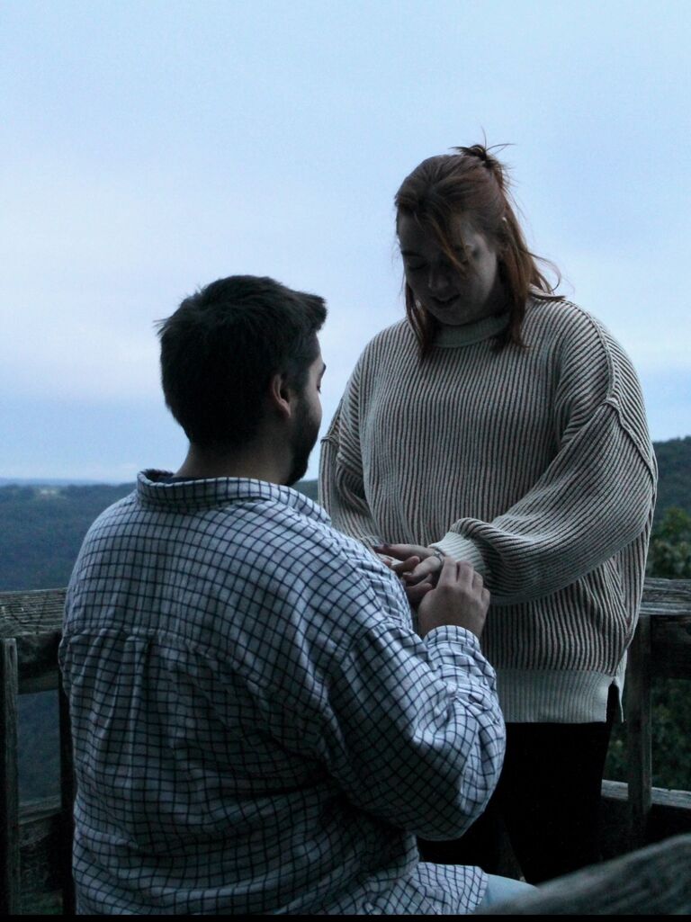 Joshua proposed to Mackenzie at Cooper's Rock in Morgantown. Even though the sun didn't rise and it was a rainy day, it was the perfect time for an engagement in our favorite place. Joshua had gathered most of our close family and friends to be waiting at the annual tailgate to celebrate. WVU even won, so country roads really did bring us home. 