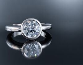 Bezel-set engagement ring