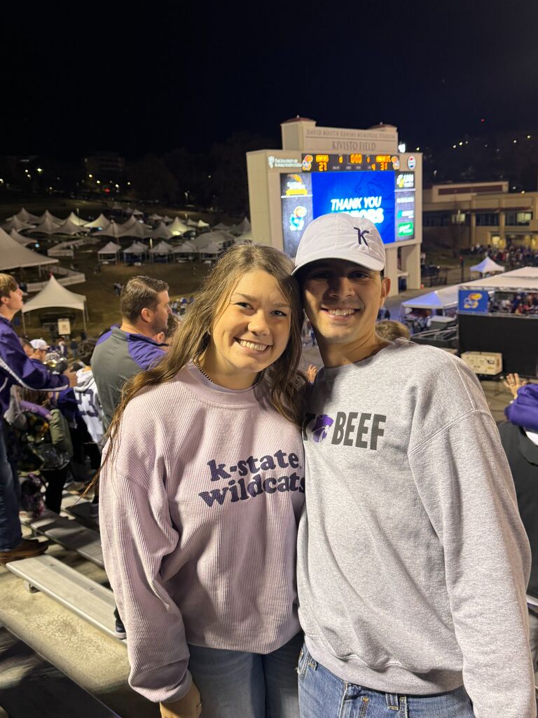 Sophia and Justin went to the Kansas State vs. Kansas football game with Sophia's family.