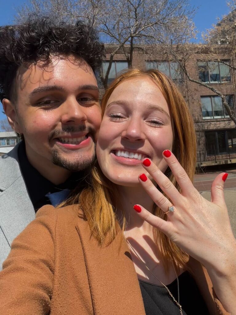 We got engaged! Alejandro set it up perfectly. He asked Lilly to take the day off from her internship and from her part-time job at a pizza restaurant to help him take pictures for Latino Day at the Minnesota State Capitol. After the event, Alejandro suggested they grab lunch and take a walk by the river. Lilly was very hungry and almost rushed the walk, but luckily, she kept quiet and Alejandro proposed in front of the Minneapolis skyline! Lilly cried off all her makeup, then Alejandro surprised her with dinner at the Capitol Grille, drinks, and a rooftop hot tub at the Hewing Hotel. They kept the engagement a secret just for the night, and then told everyone the next day. It was beautiful.
