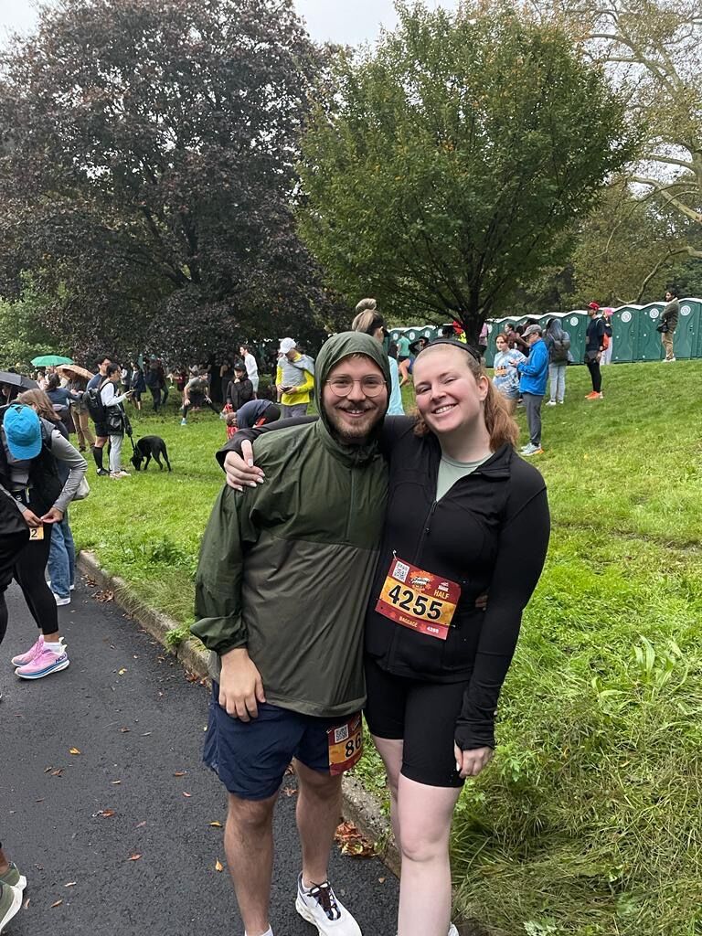 Matt and Rebecca run their first half marathon together. Rebecca's parents were excellent cheerleaders, even in the rain and the cold! 