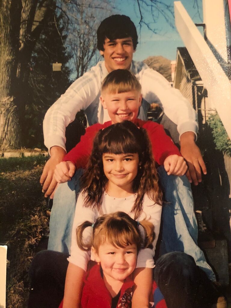 Blonde-haired, blue-eyed Joshua with his incredible siblings