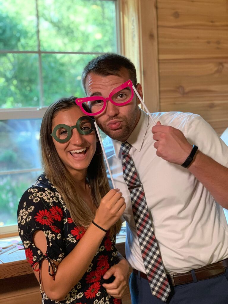 Travis and Zoe at David and Priscilla's wedding (now our bridesmaid and officiant). This was the first time Zoe met any of Travis friends.