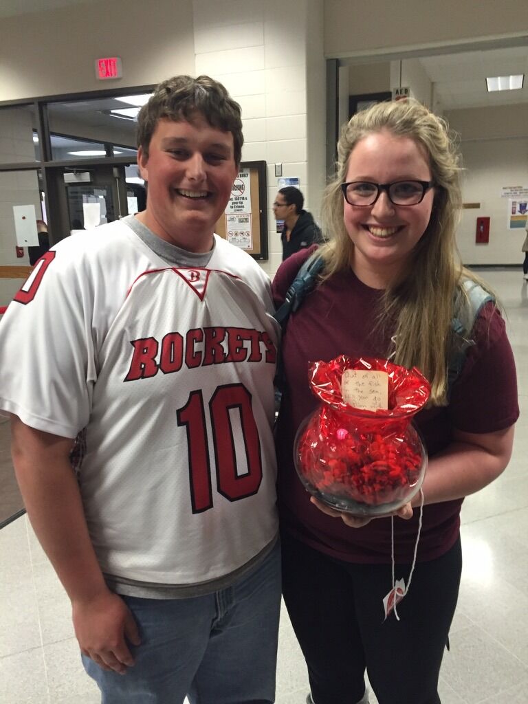 The promposal & our first picture together "Out of all the fish in the sea, will you go to prom with me?"
