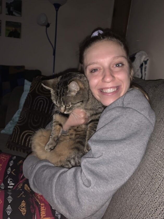 Amidst a pandemic, they moved in together and adopted their first cat. Tuna