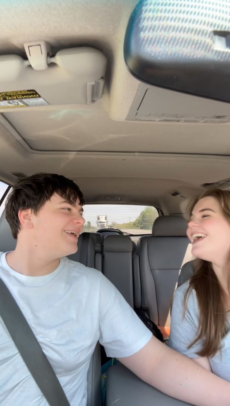This picture was taken from a video the groom captured of us singing Unwritten by Natasha Bedingfield; the bride had to remind the groom that looking at the road was necessary 