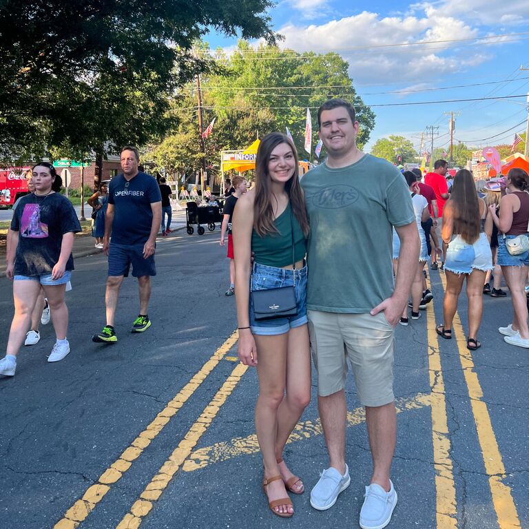 Nicole takes Austin to his first Matthews Festival (featuring caramel corn and a terrible Prince cover band)